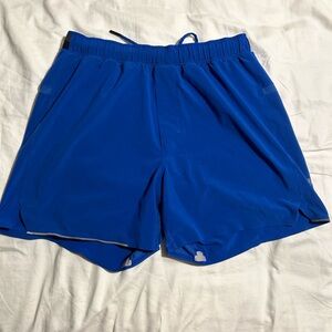 blue Lululemon men’s running shorts, medium